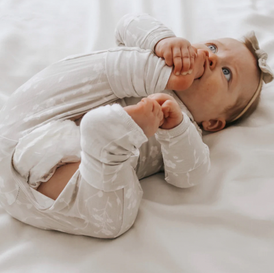 Do Babies Sleep Better in Footie Pajamas?