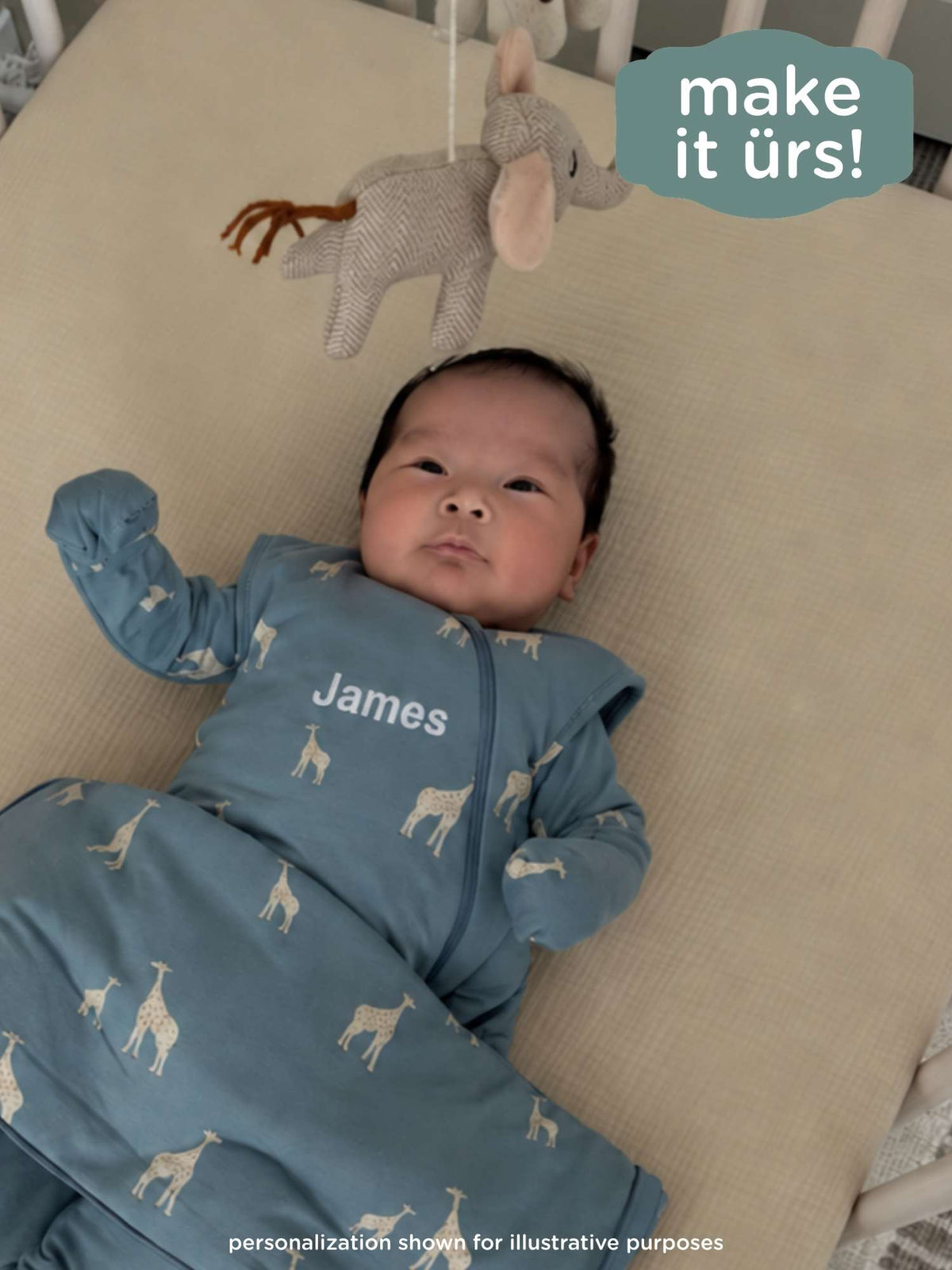 Blue baby transitional sleep sack with giraffe print and 'James' embroidery