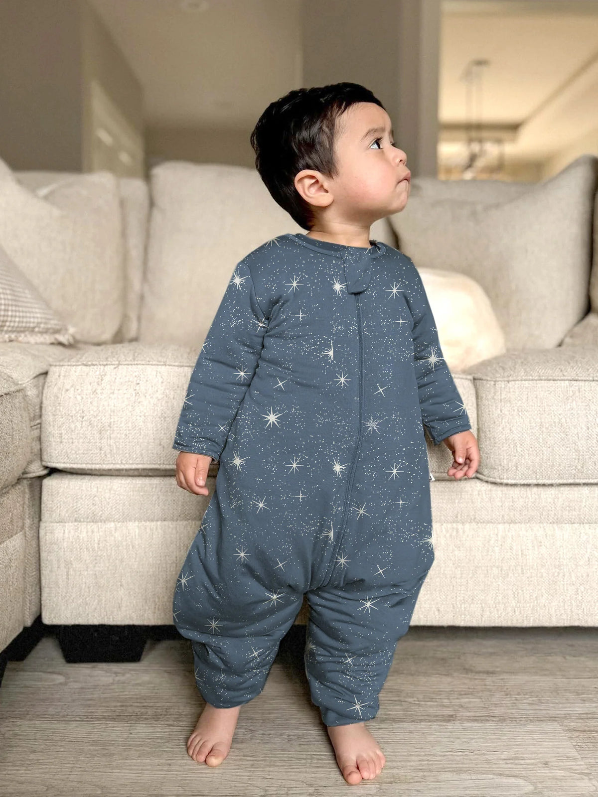 Dark blue star-print footie sleep sack with long sleeves and enclosed feet