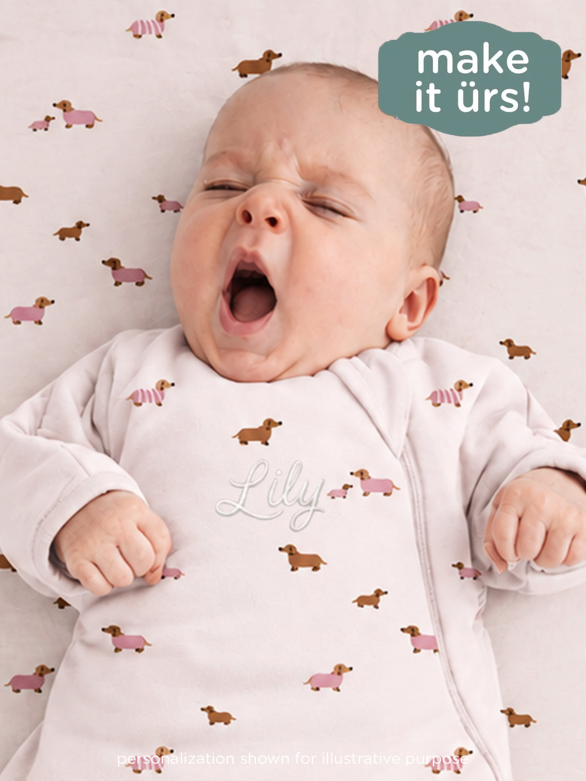 Long sleeve transitional swaddle sack, white dog print, zip front with small Lily logo