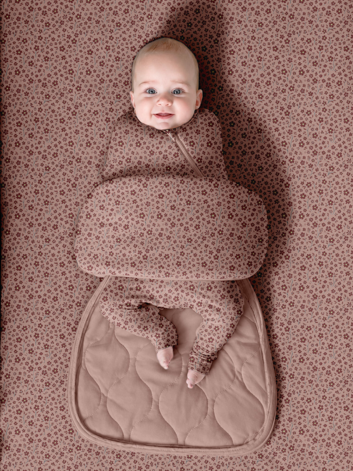 Pink floral infant sleep sack with long sleeves and padded bottom pouch