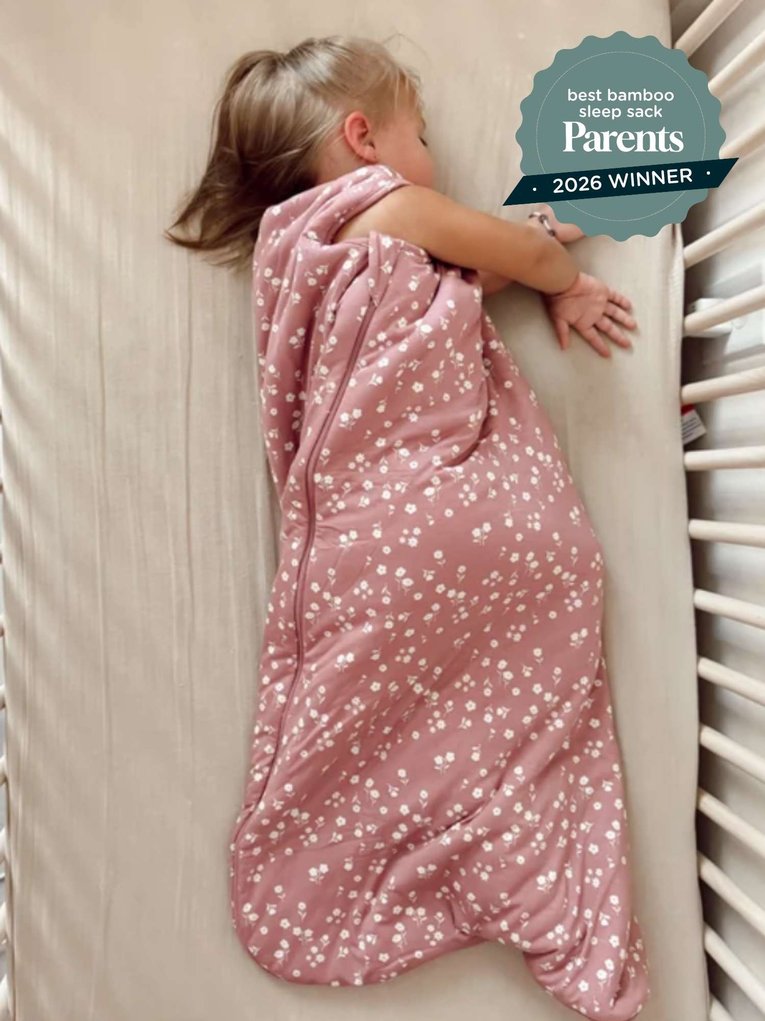 Blush floral 2.5 TOG sleep sack with allover white print and long leg opening