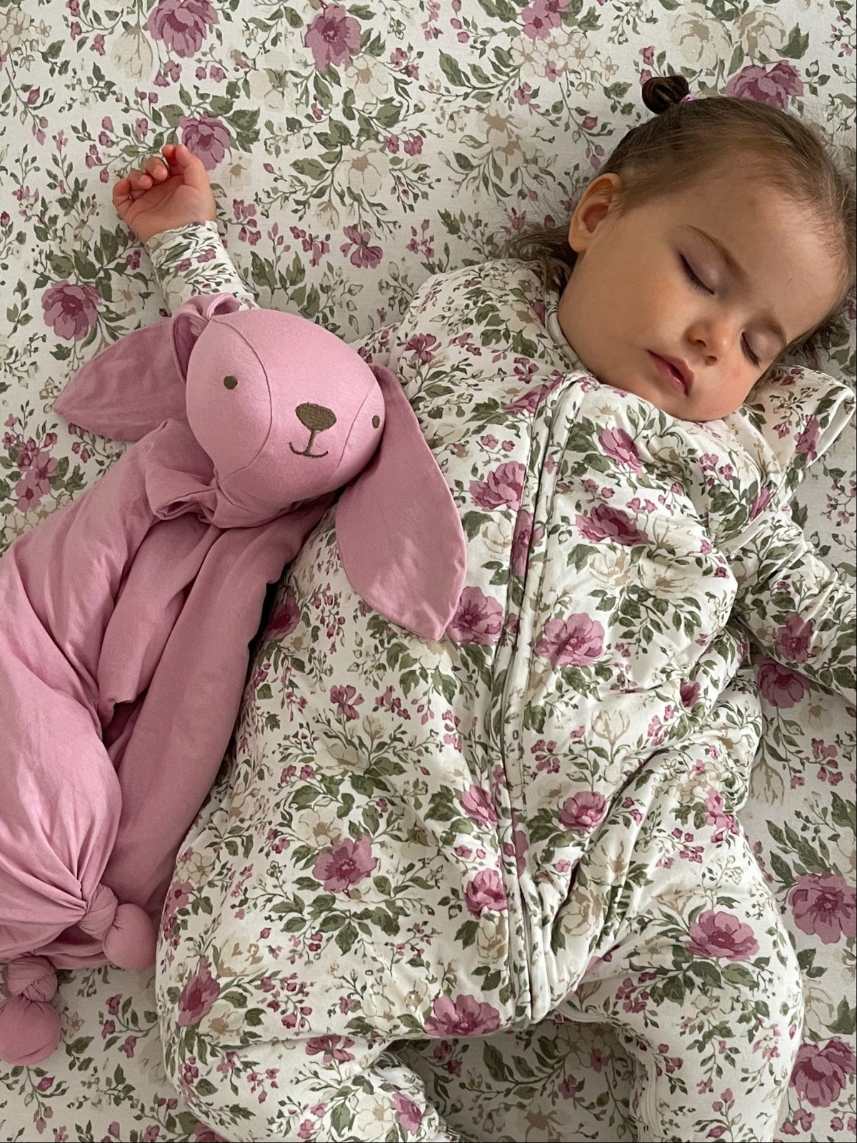 Pink bunny lovey plush with long ears and attached security blanket, soft fabric