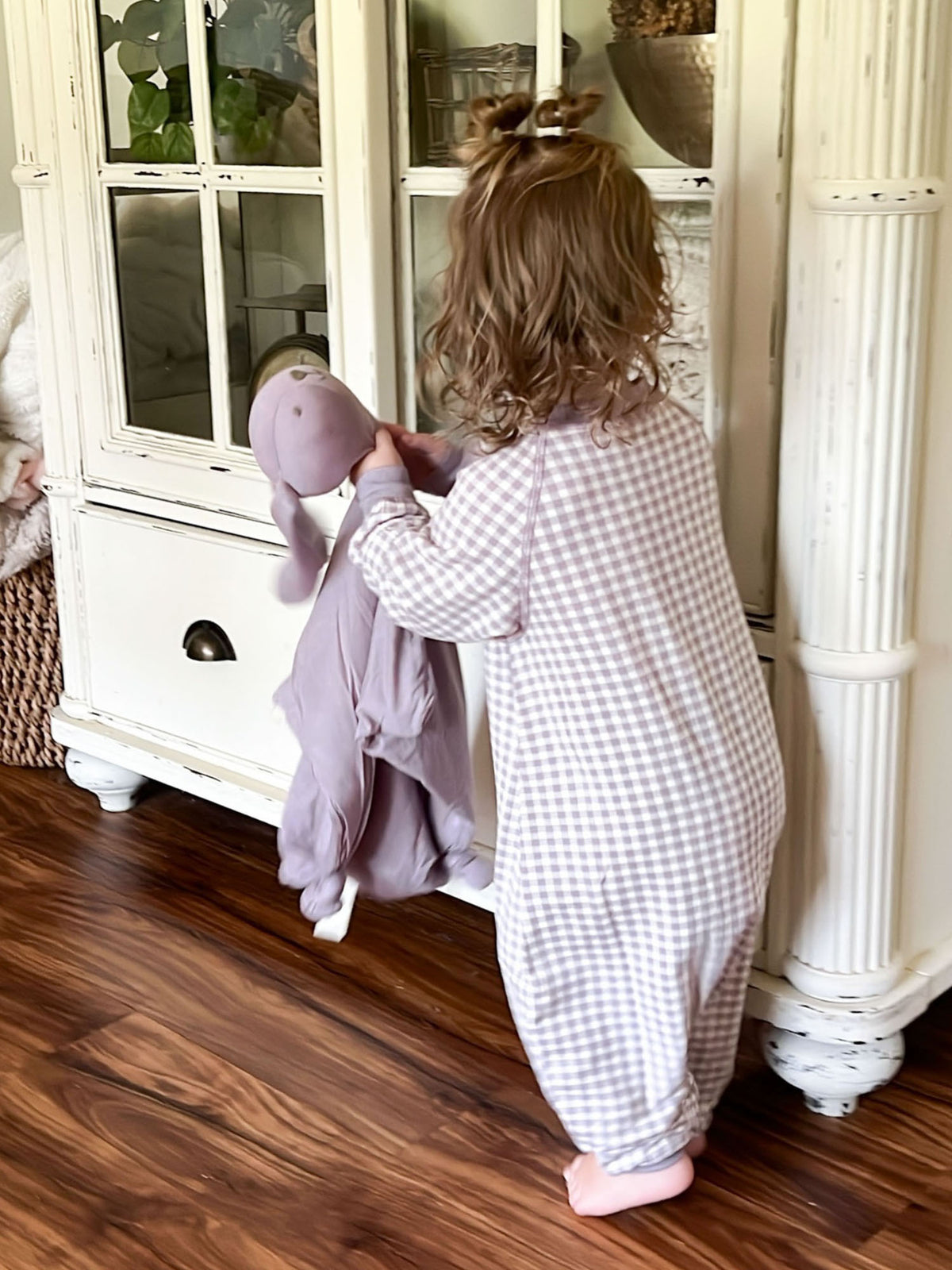 Lavender gingham fleece footed jumpsuit with long sleeves, back view