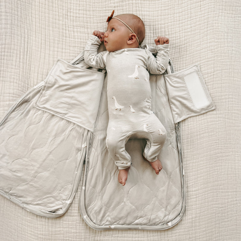 2.5 TOG swaddle sleep sack with goose print, front zipper, cream