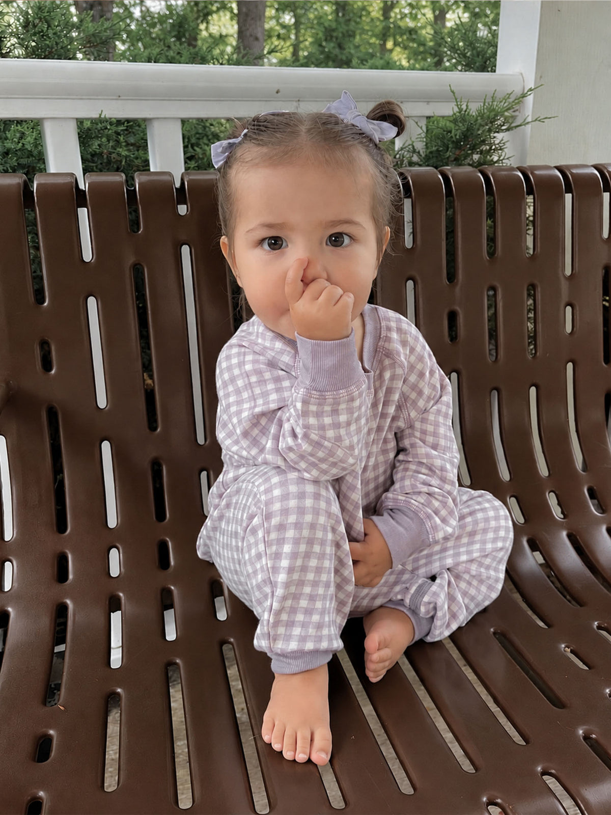 Lavender gingham fleece footed jumpsuit with long sleeves, mitten-like cuffs