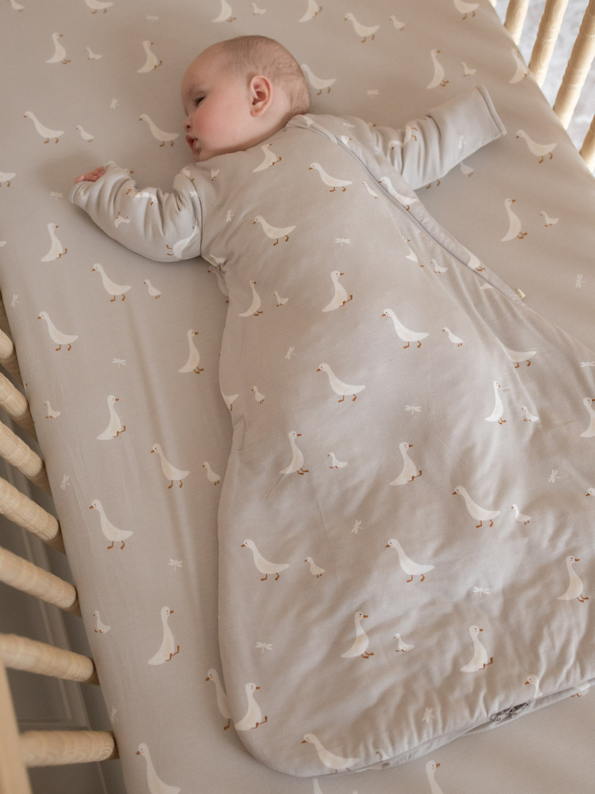 Goose-print long sleeve sleep sack with covered legs and front zipper, off-white