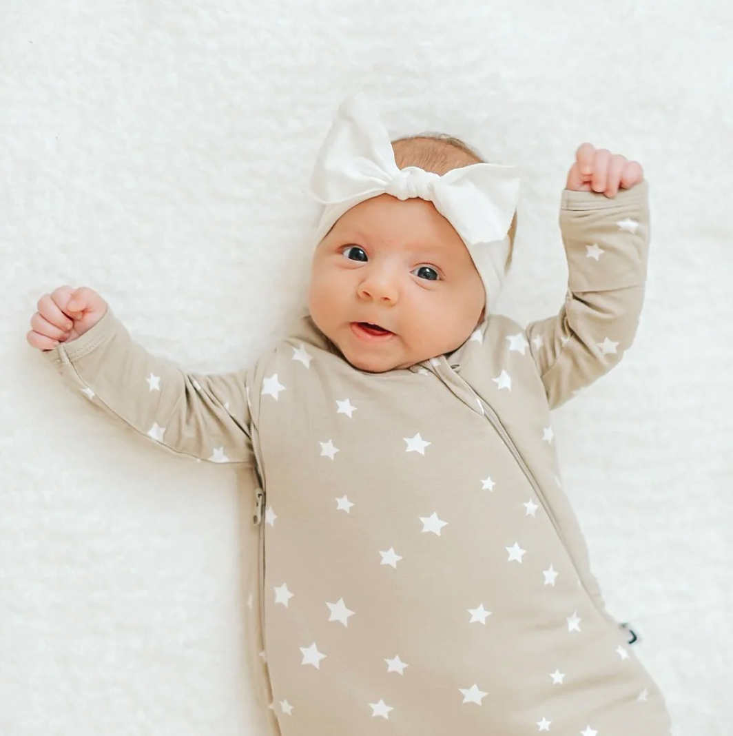 Arms out swaddle hot sale newborn