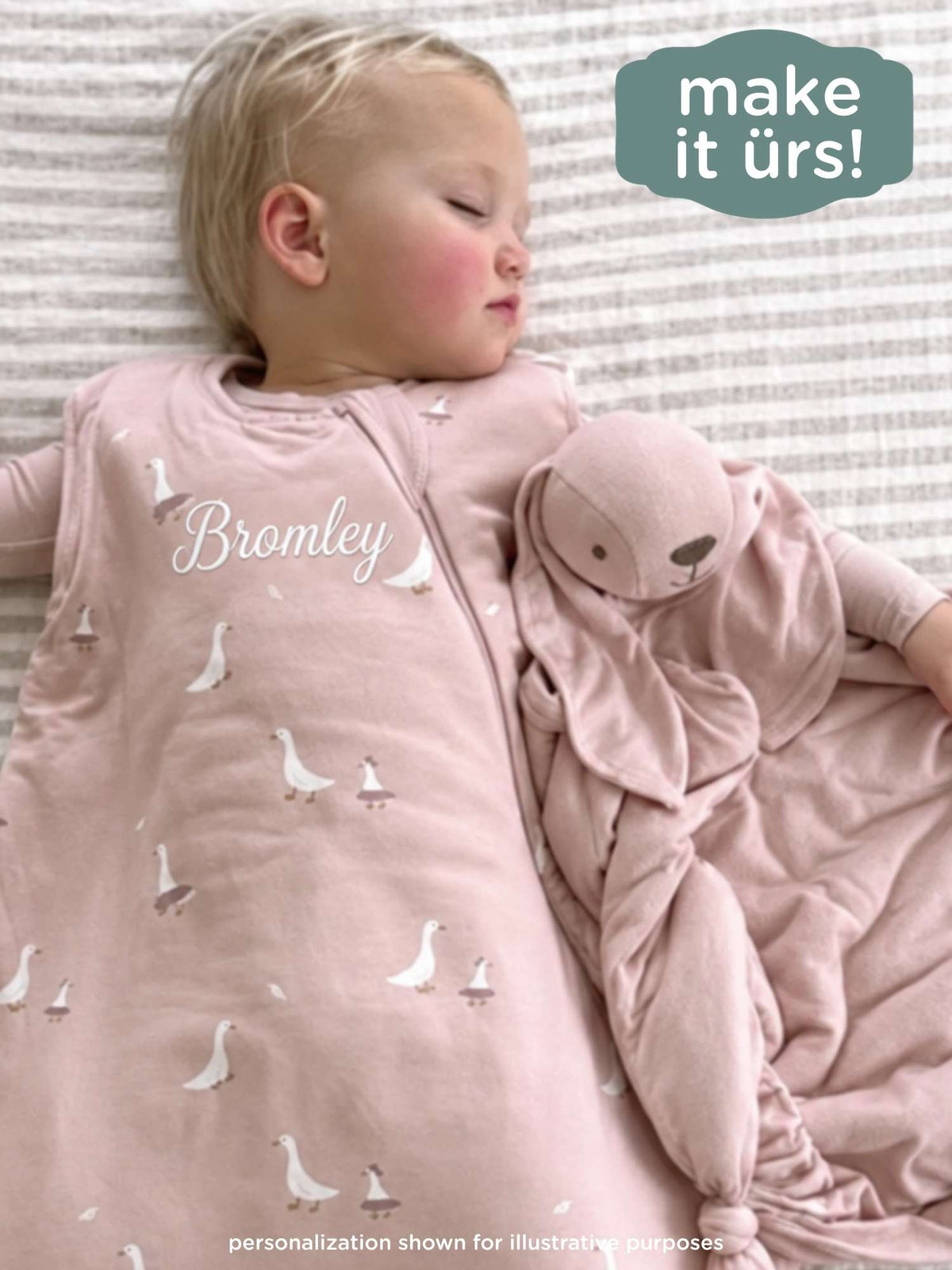 Pink toddler sleep sack with all-over swan print and embroidered name on front