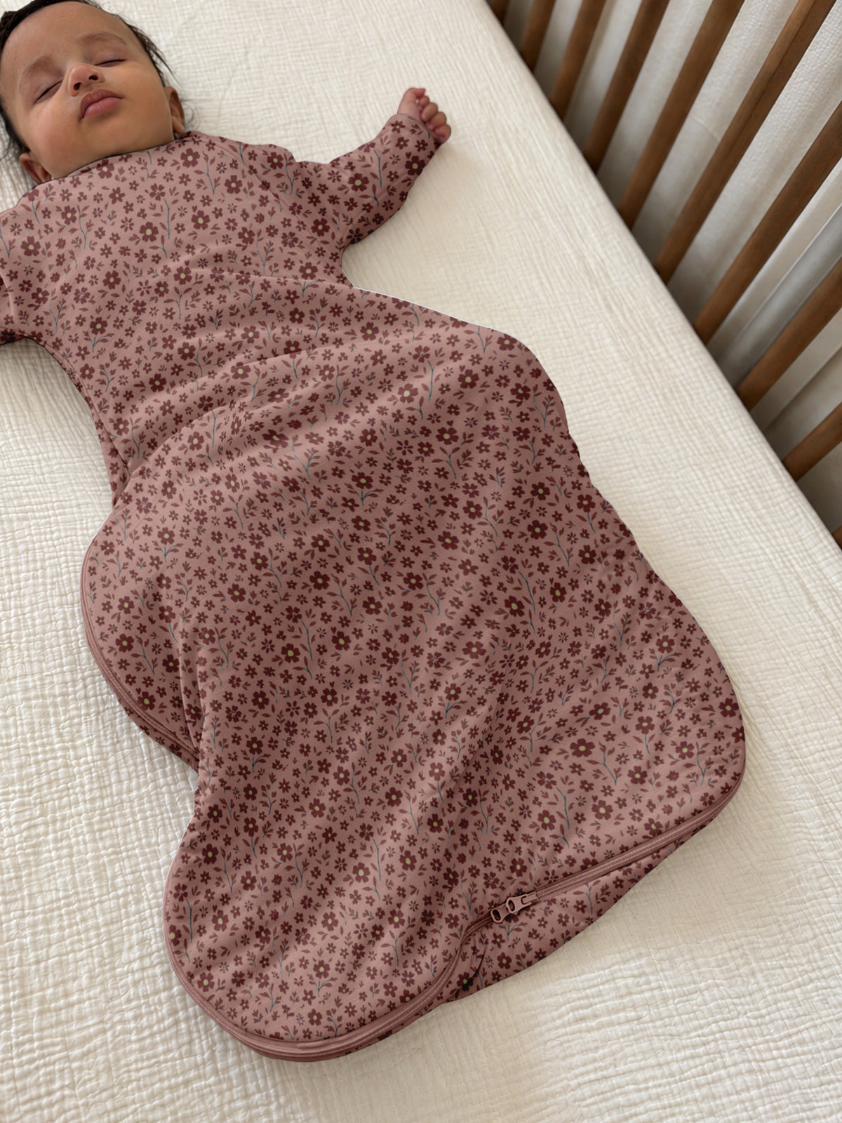 Floral long-sleeve swaddle sack with padded bottom and roomy leg opening