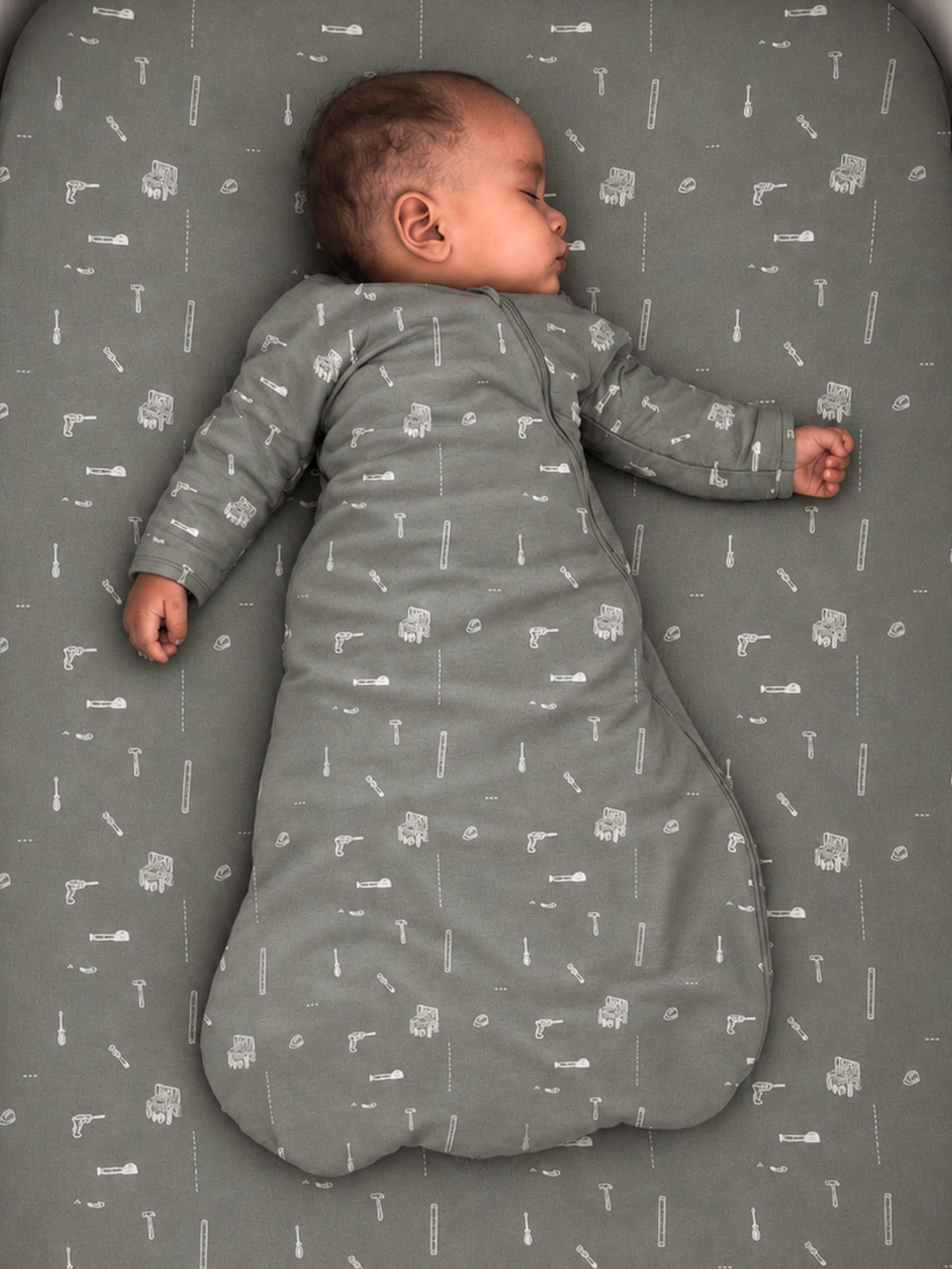 Long-sleeve transitional swaddle sack, 1.0 TOG, dark gray with white tool print, side