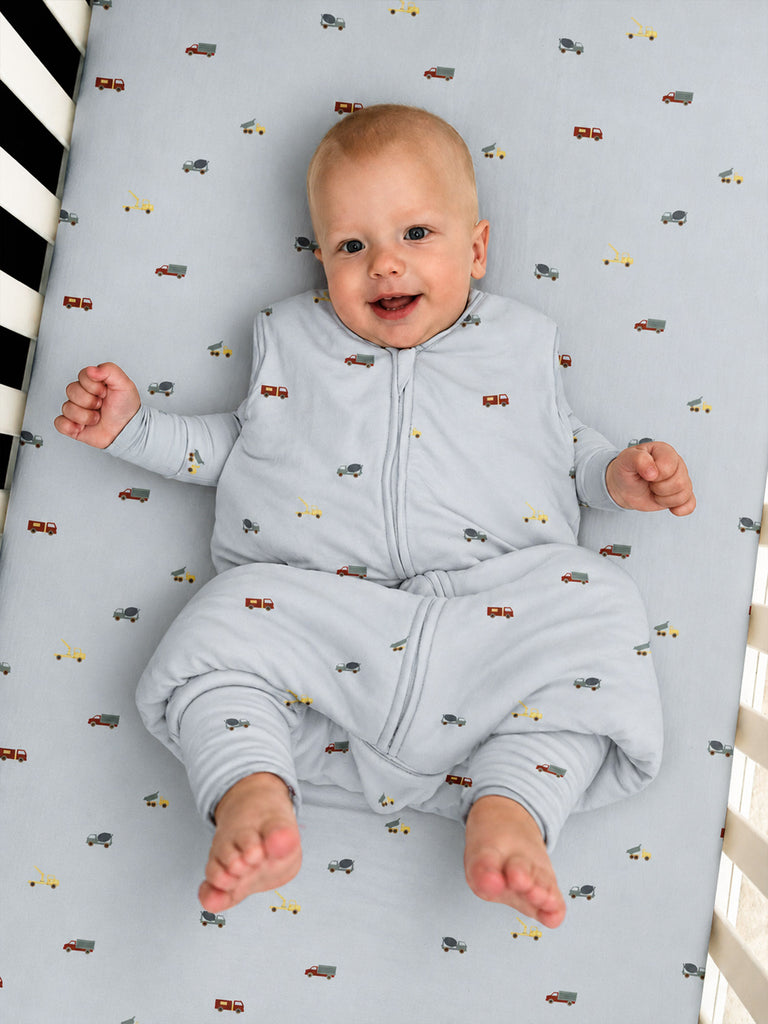 Light blue footie sleep sack with vehicle pattern, two-way zipper, enclosed feet