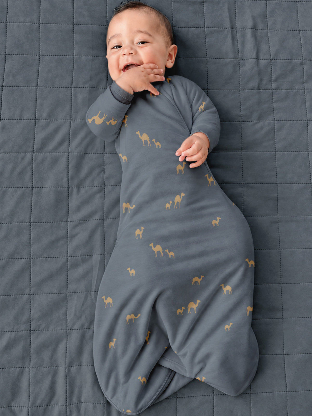 Long-sleeve swaddle sack in slate blue with camel print, covered legs