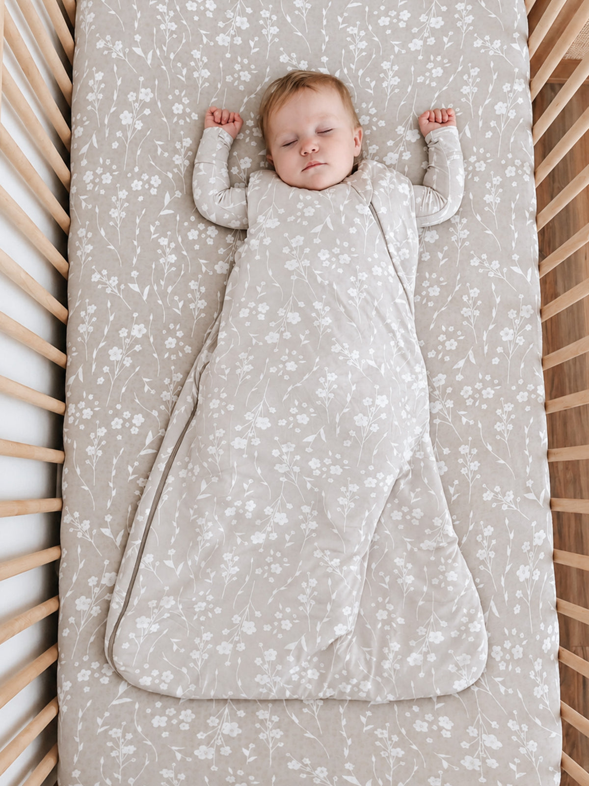 1.0 TOG sleep sack in light gray with white floral sprigs, long sleeves, zip