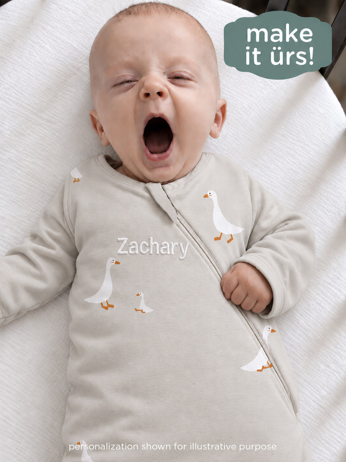 Cream long-sleeve swaddle sleep sack with goose print and zip-front neckline