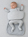 Swaddle sleep sack shown open: zip front and foot area with padded gray lining