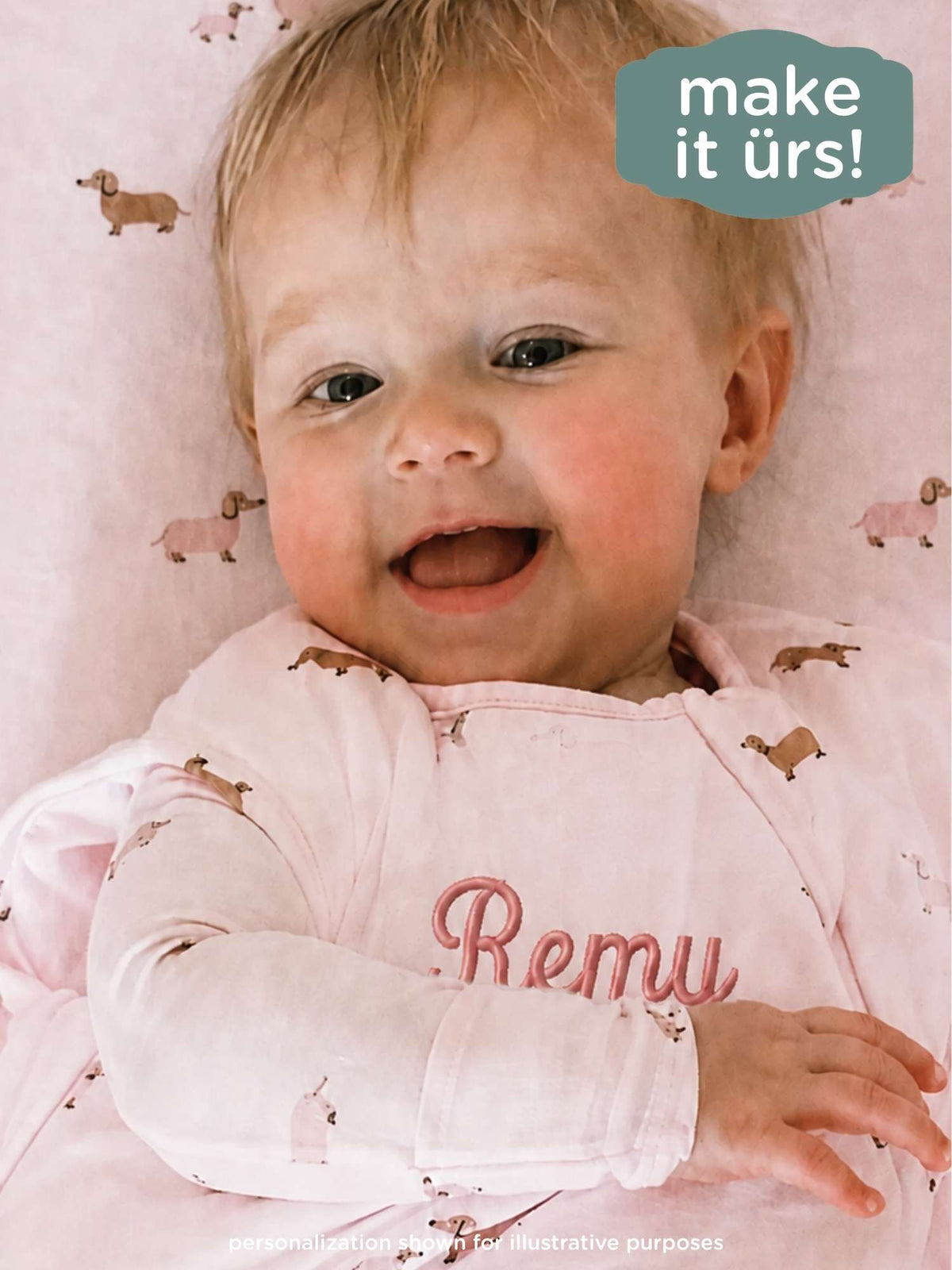 Pink dog-print 1.0 TOG sleep sack with long sleeves, front zip, and Remu logo