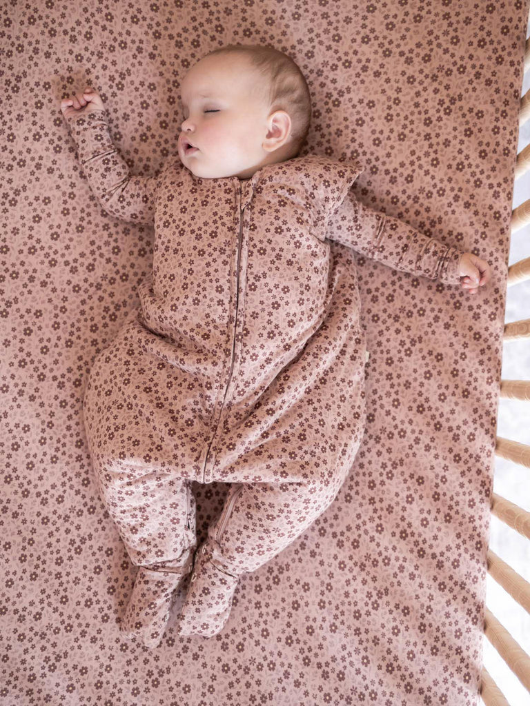 Blush pink floral footed sleep sack with long sleeves, full-length zipper, TOG 1.0.