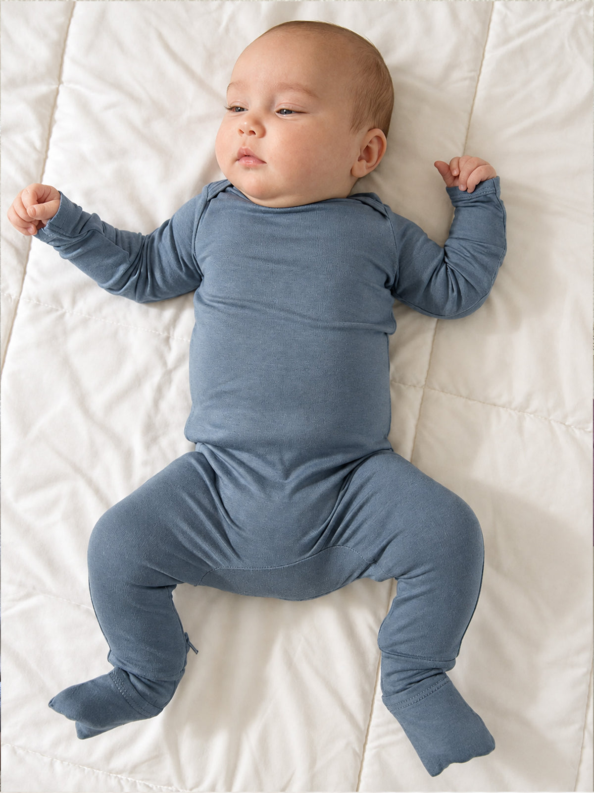 Hush blue convertible pajama with long sleeves and footed legs