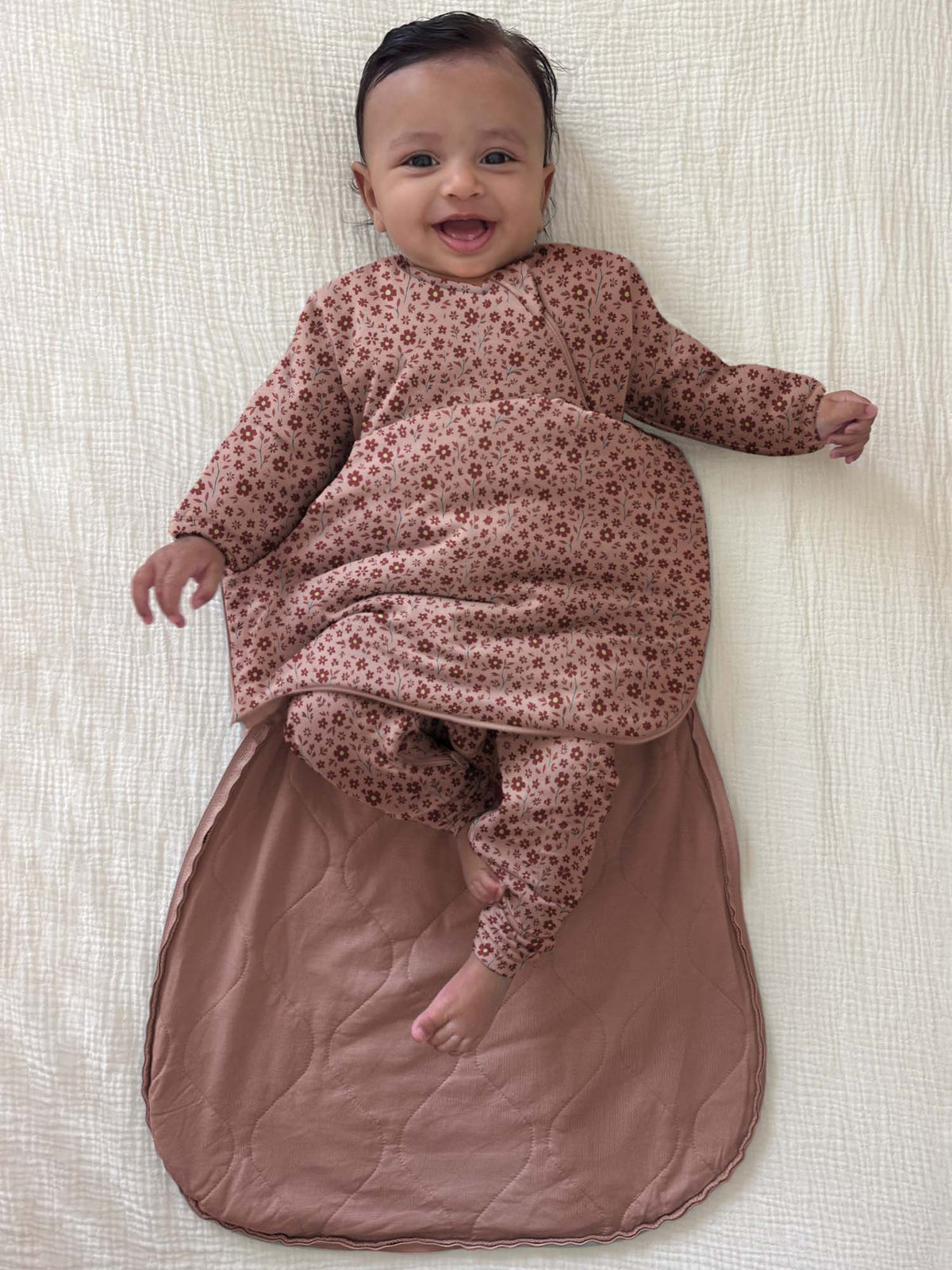 Long-sleeve swaddle sack with petal floral print, zip front and gathered cuffs