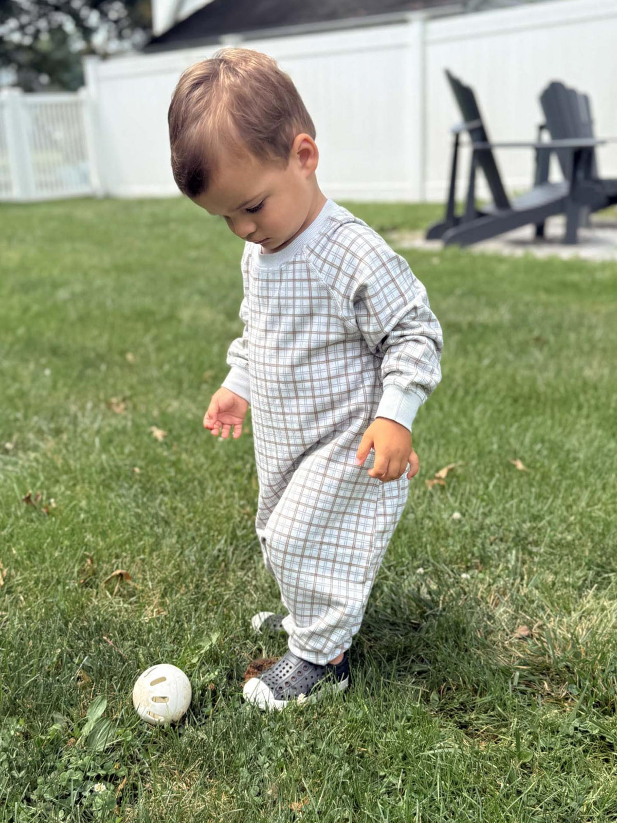 Plaid fleece baby jumpsuit, long sleeves, footed legs, light blue and tan grid