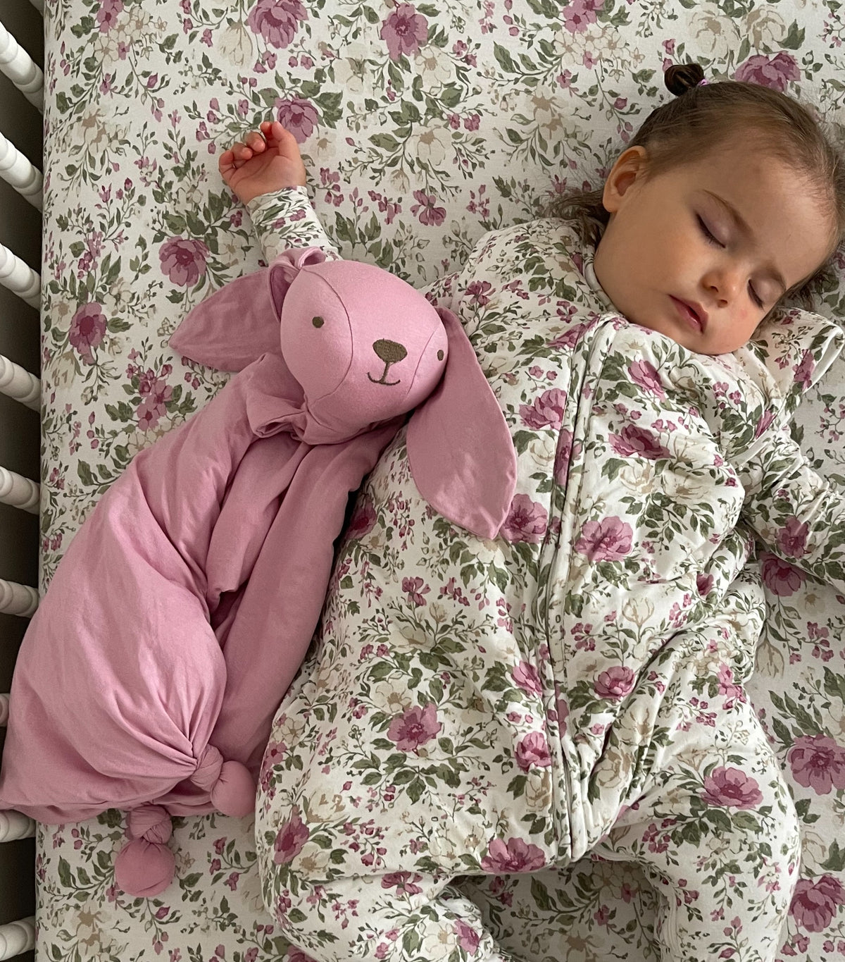 Pink bunny lovey plush with long ears and attached security blanket, soft fabric