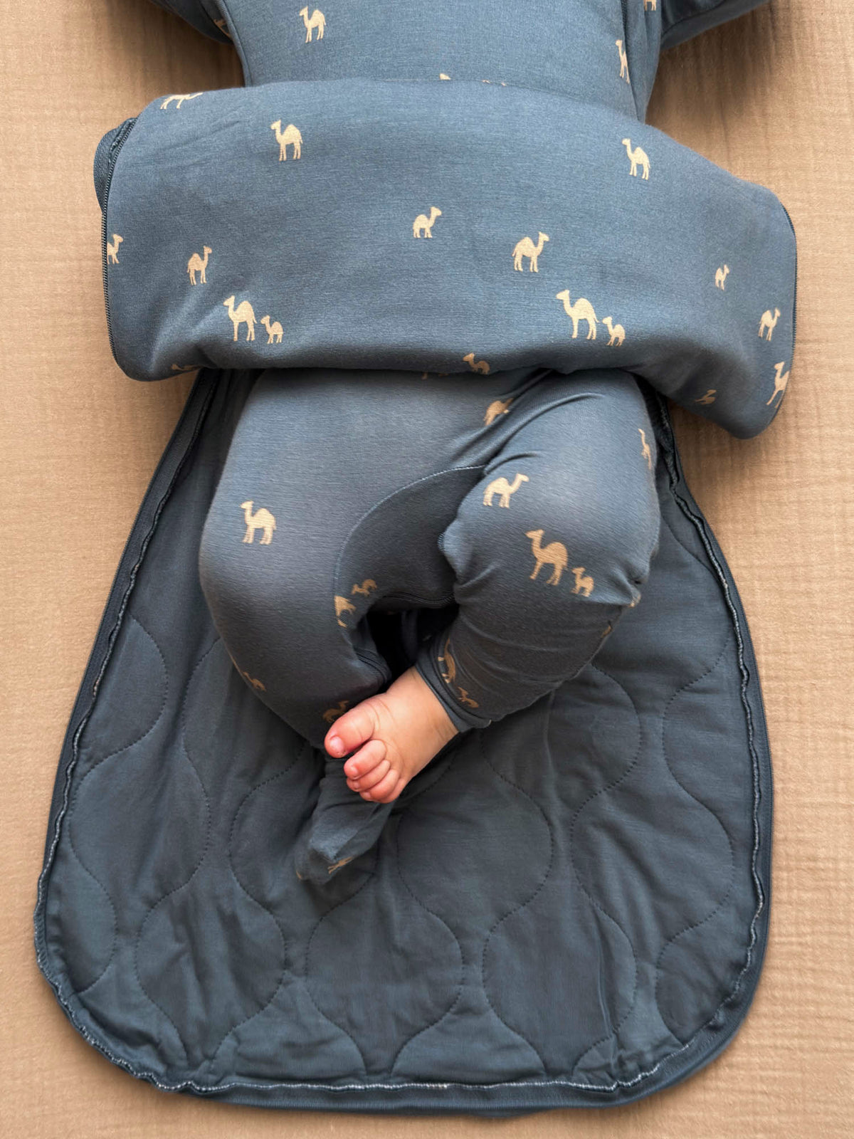 Long-sleeve swaddle sack, slate blue camel print, padded foot opening