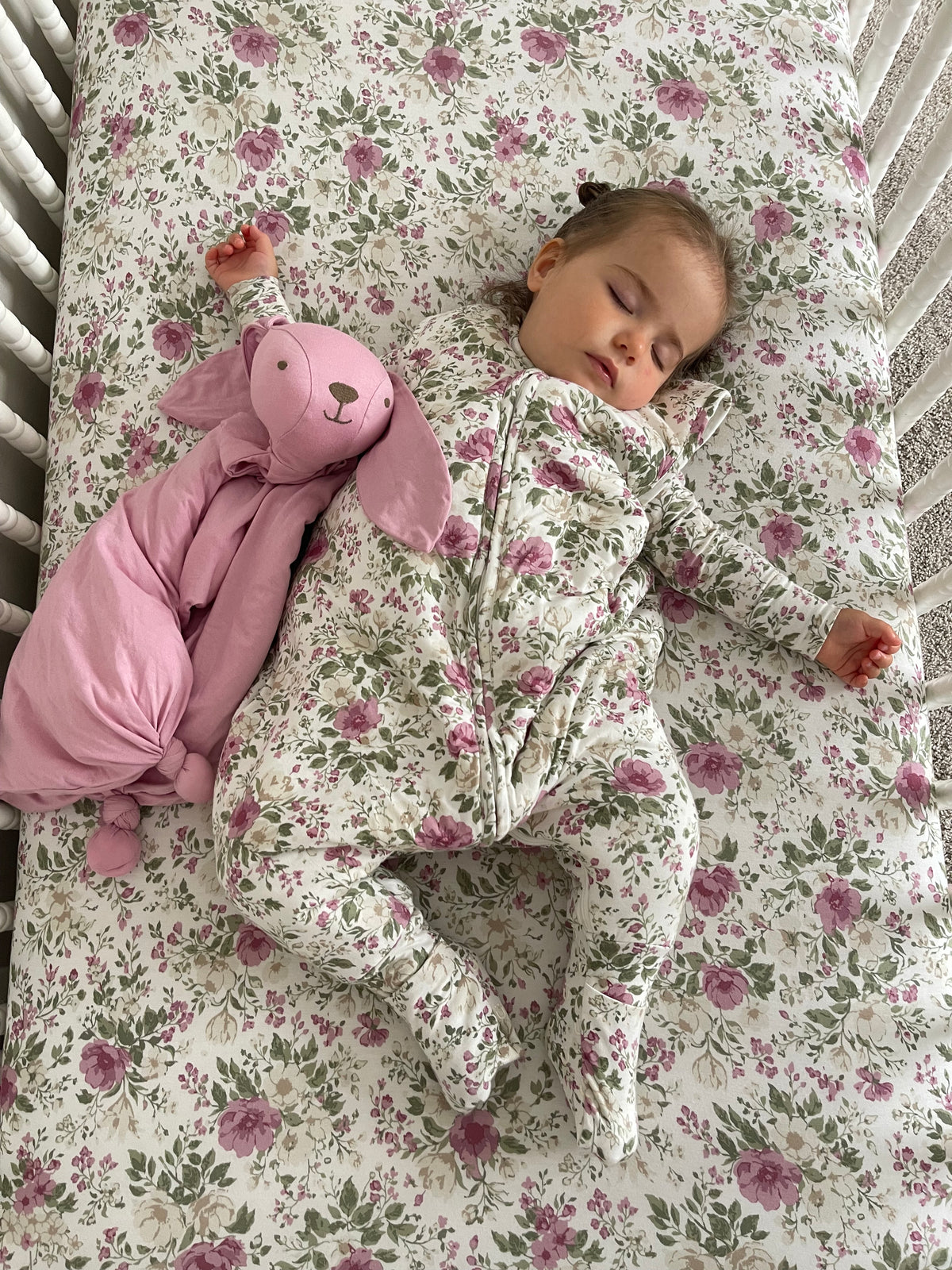 Pink bunny lovey plush with stitched face and long ears, includes security blanket