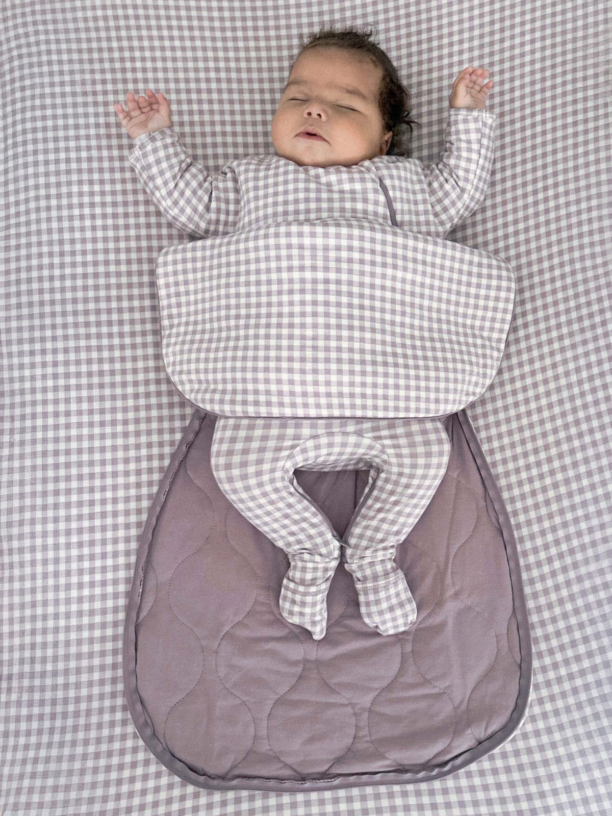 Long-sleeve transitional swaddle sack, check top with gray quilted base and neck opening