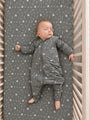 Gray long-sleeve footed sleep sack with white tool icons