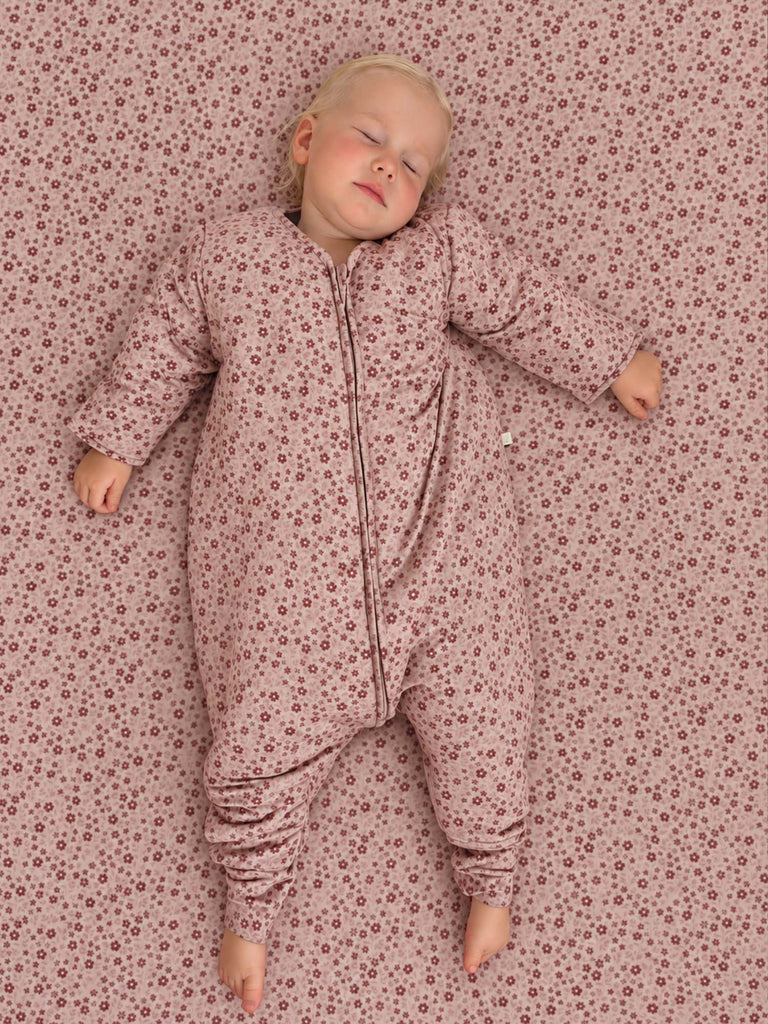 Pink heart-print long-sleeve footed sleep sack with front zipper, cuffed sleeves